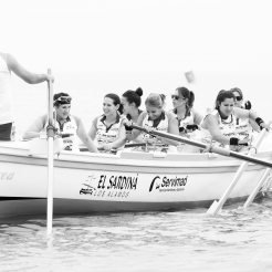 A crew of female rowers in a boat